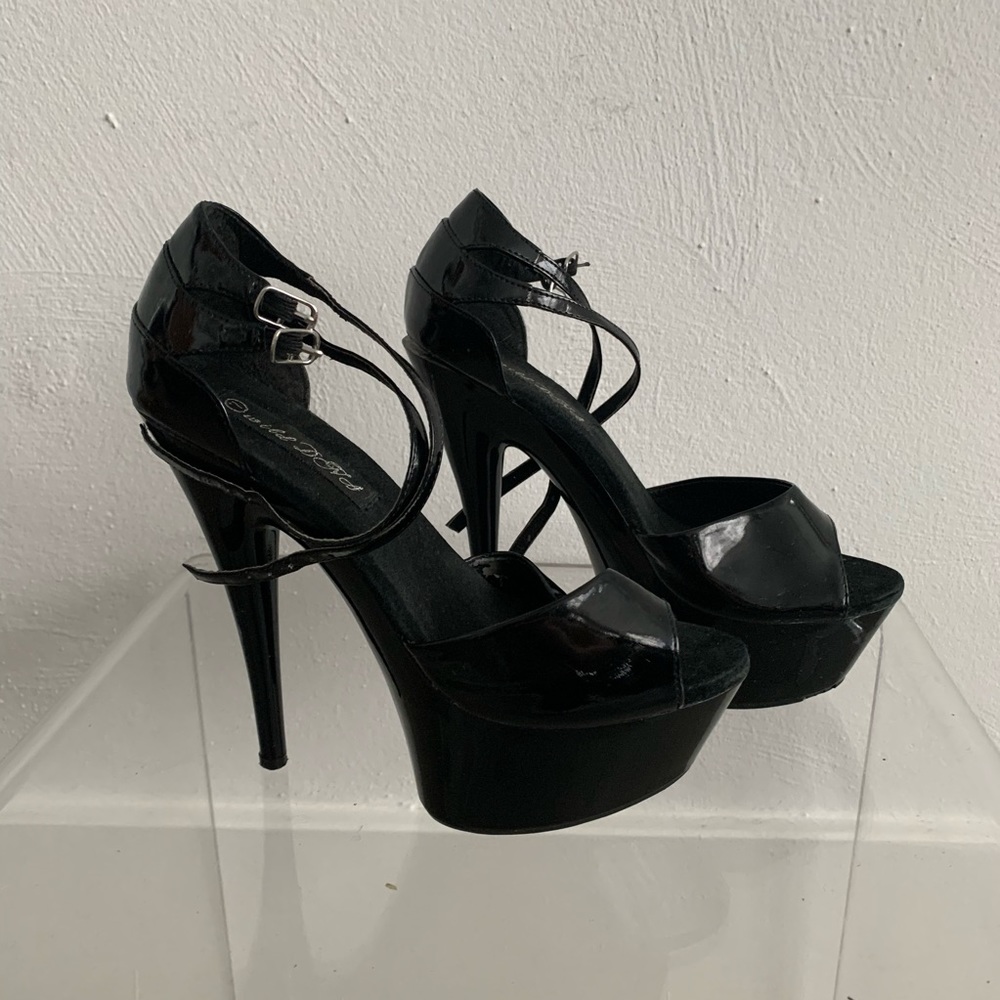 Patent leather platform stiletto heels.